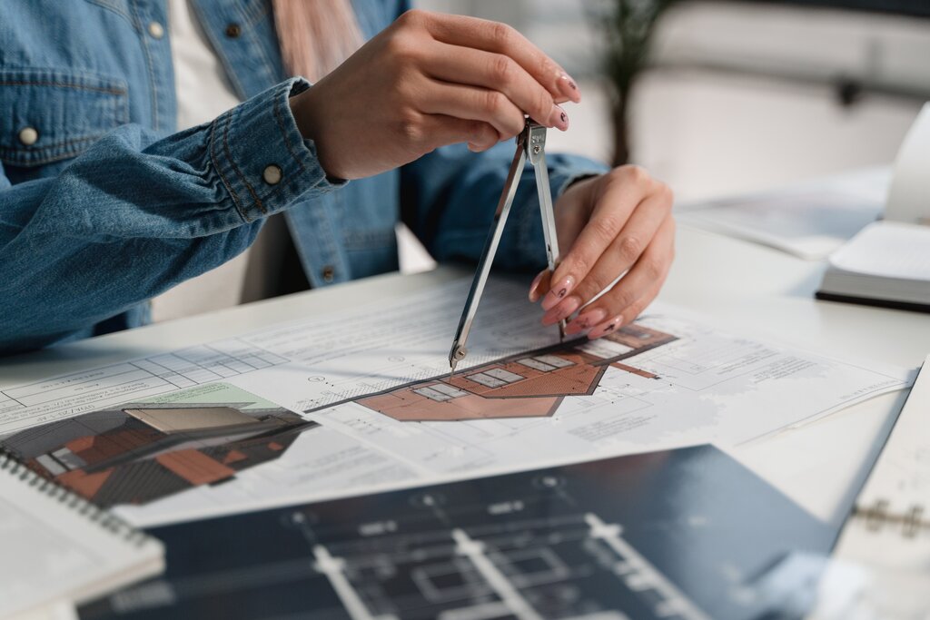 Person measuring space: how to design a carport