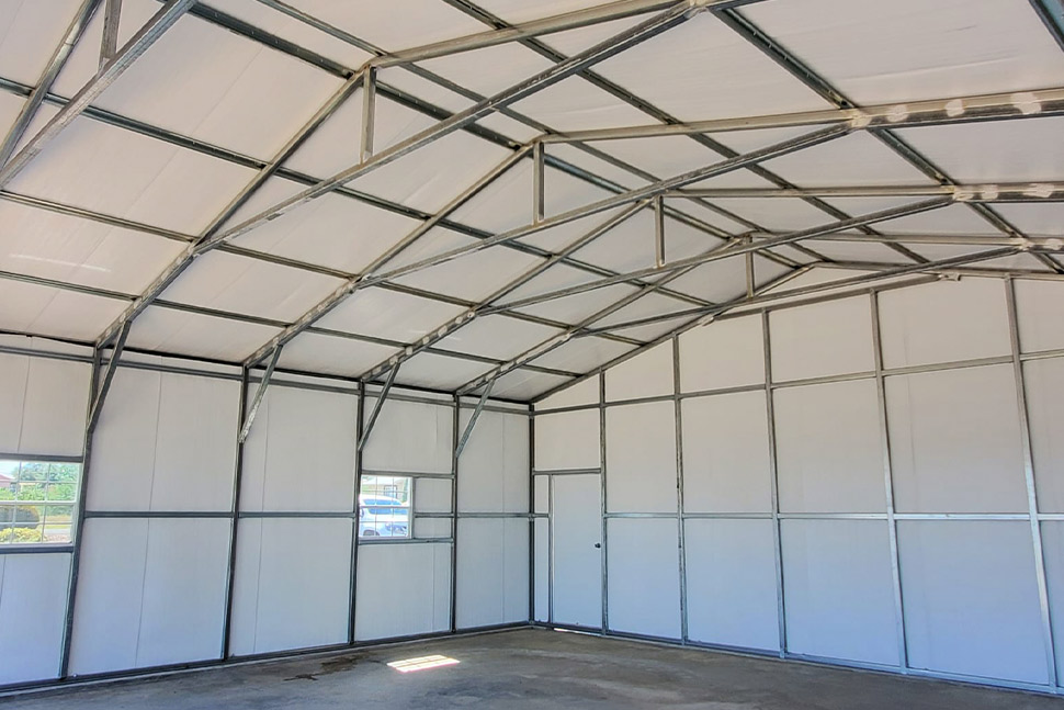 Inside a metal garage carport by American Steel