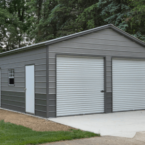Two-car metal garage in Appleton, WI featuring pewter gray horizontal siding, two roll-up doors, and a walk-in door, built by American Steel Carports, Inc.